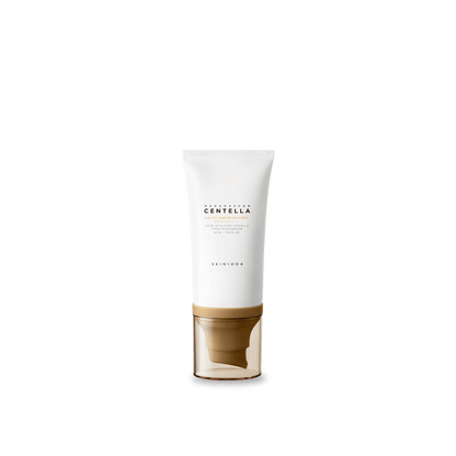White and beige tube of gentle suncream with SPF30 PA++++ protection on white background