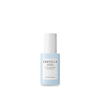 Light blue serum bottle with white cap labeled for centella skincare and hydration benefits on plain background