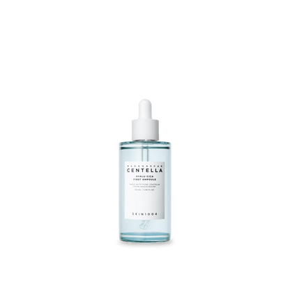 Clear blue serum ampoule bottle with white dropper cap and minimalist centered label on transparent background