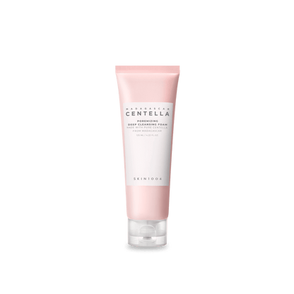 Pink tube of deep cleansing foam with white label featuring centella extract for thorough pore cleansing on white background