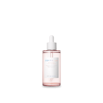 Clear dropper bottle of pore minimizing ampoule serum with light pink liquid and minimal label design
