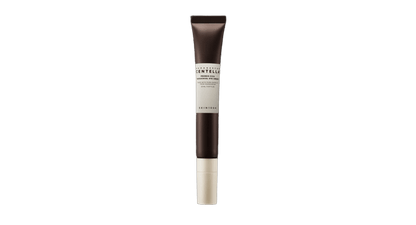 Slim dark brown tube of Bakuchiol eye cream with beige label and pump dispenser for anti-aging skincare care