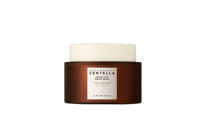 Brown jar with white lid containing hydrating centella cream for enriched skin care benefits