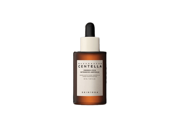 Brown glass dropper bottle with white label for hydrating skincare ampoule on a white background