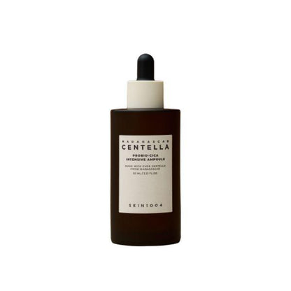 Brown glass dropper bottle of SKIN1004 Probio-Cica ampoule for instant calming skincare benefits on white background