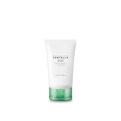 White tube of hydrating cream with green cap labeled for centella and skin soothing benefits on plain background