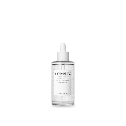 Clear glass dropper bottle with white label and brightening capsule ampoule serum for deep hydration