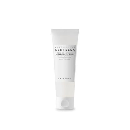 White tube of tone brightening cleansing gel foam with minimalistic text design on a transparent background