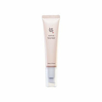 Slim beige tube of wrinkle-improving eye cream with clear pump applicator on a white background