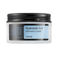 White jar of intensive cream with black lid highlighting hydration and moisturizing benefits on a soft blue label