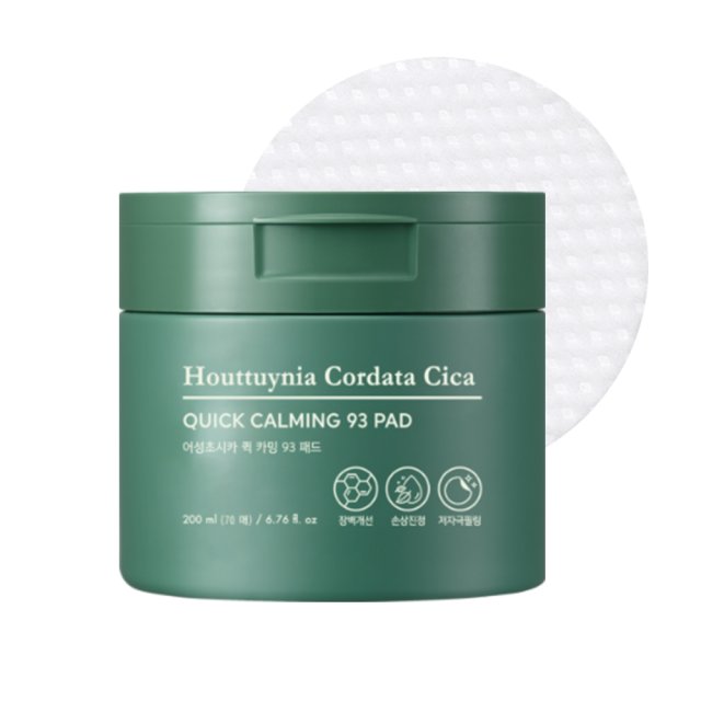 Green container of calming skincare pads with textured white pad displayed behind, promoting soothing skin care benefits