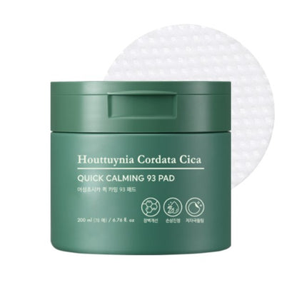 Green container of quick calming pads with textured surface, designed for soothing and calming skin care use