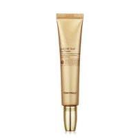 Gold-toned tube of anti-wrinkle snail eye cream with minimalist text and shiny metallic cap on white background