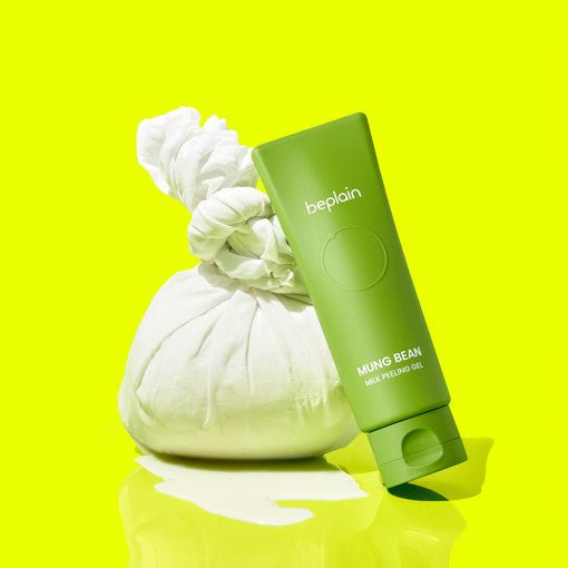beplain Mung Bean Milk Peeling Gel 120ml tube in green with white cloth pouch on bright yellow background