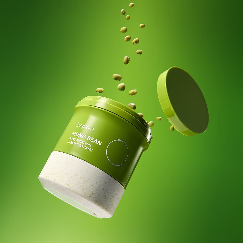 beplain Mung Bean Pore Grinding Cleansing Balm 100ml in green jar with mung beans falling for effective cleansing