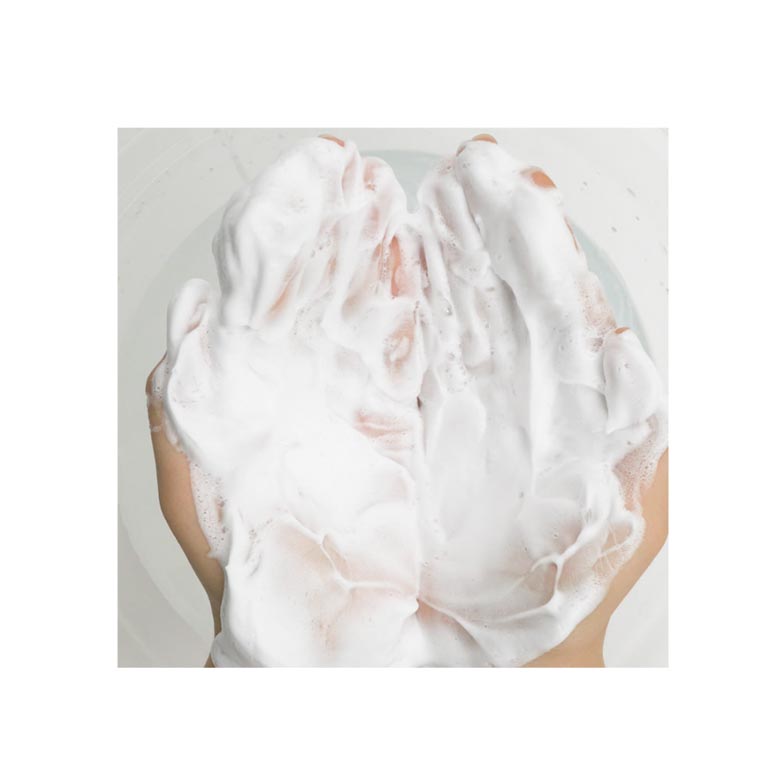 beplain Pink Salt AHA BHA Cleansing Foam 120ml rich creamy foam on hands demonstrating exfoliation effect