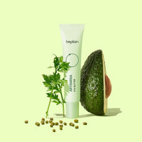 beplain Artemisia Eye Butter 25ml tube alongside fresh artemisia leaves and halved avocado for deep hydration benefits