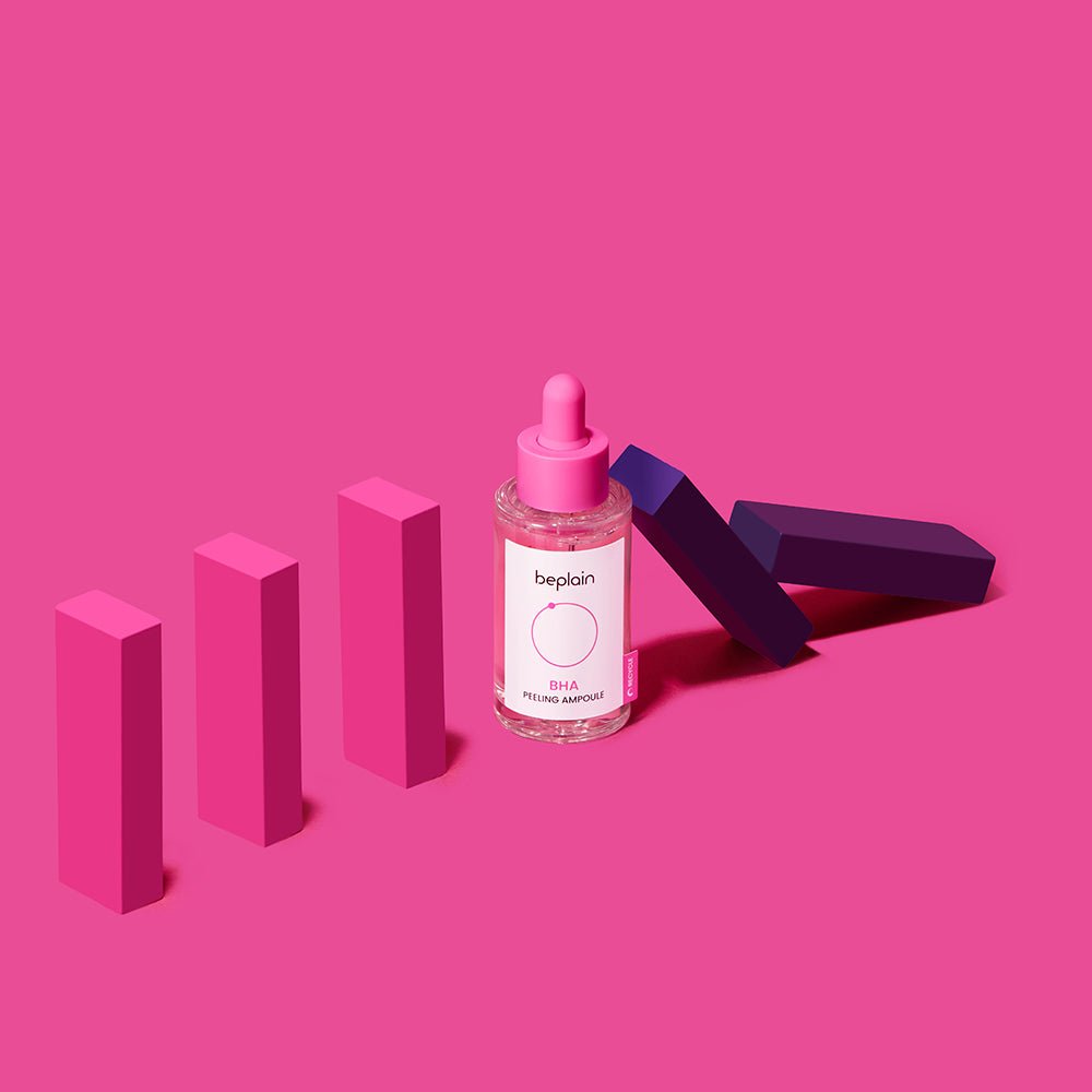 beplain BHA Peeling Ampoule 30ml with pink dropper bottle positioned among pink and purple blocks on bright pink background