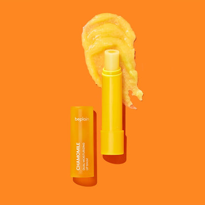beplain Chamomile Dual Moisturizing Lip Balm 3.6g with smooth balm texture on bright orange background for intense hydration