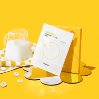 beplain Chamomile Intense Moisturizing 10P mask in white packet with yellow box and decorative daisies on bright yellow background