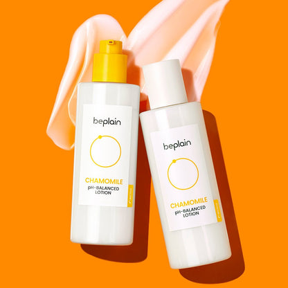 beplain Chamomile pH-Balanced Lotion 150ml bottles with yellow and white caps on bright orange background with lotion swatches