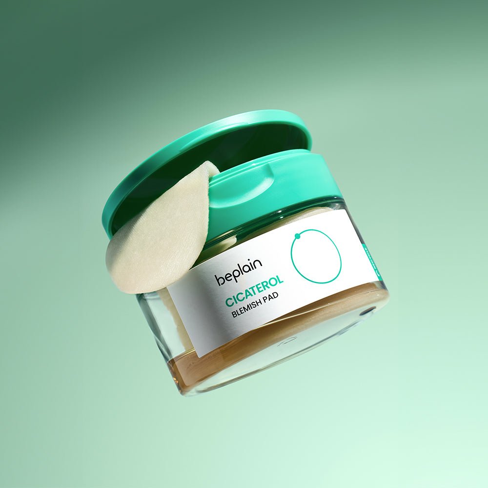 beplain Cicaterol Blemish Pads 70 sheets in clear jar with green lid featuring a cooling textured pad on top