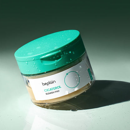 beplain Cicaterol Blemish Pads 70 sheets container with aqua green lid and cooling effect on light green surface