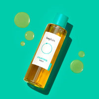 beplain Cicaterol Toner 200ml in clear amber bottle with teal cap and enhanced absorption formula droplets on turquoise background