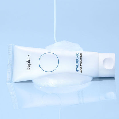 beplain Hyaluronic Aqua Moisturizer 80ml tube with creamy texture for instant hydration on light blue background