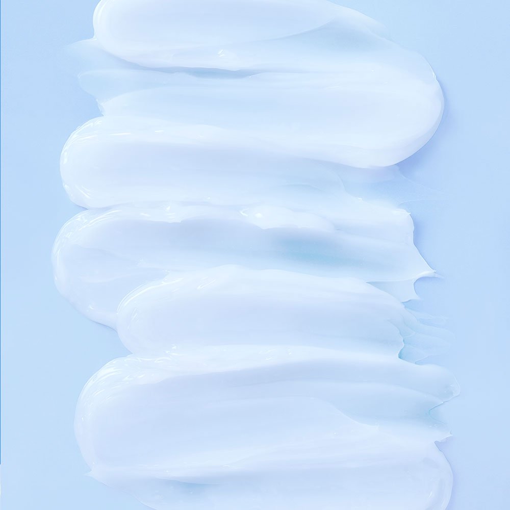 beplain Hyaluronic Aqua Moisturizer 80ml creamy white texture spread on soft blue background for instant hydration