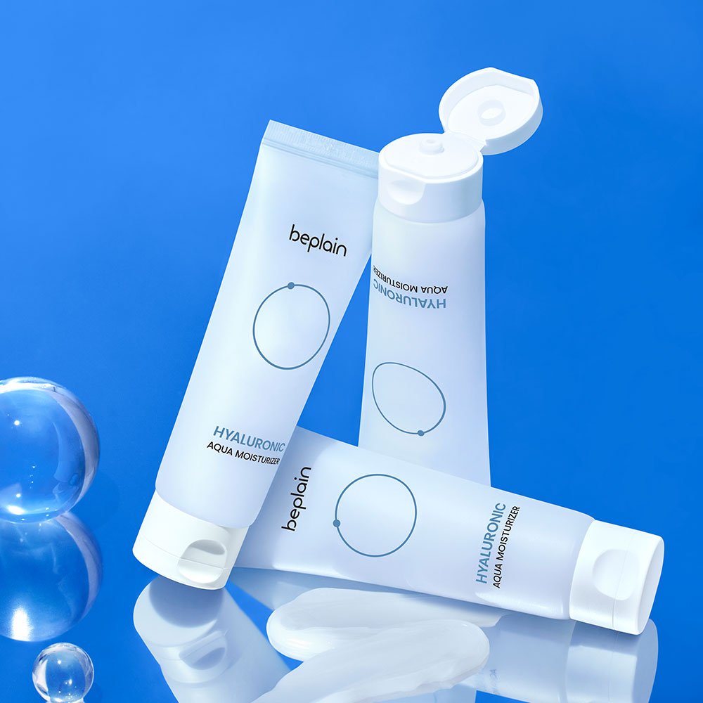 beplain Hyaluronic Aqua Moisturizer 80ml tubes on blue surface with creamy hydration texture and instant moisture effect