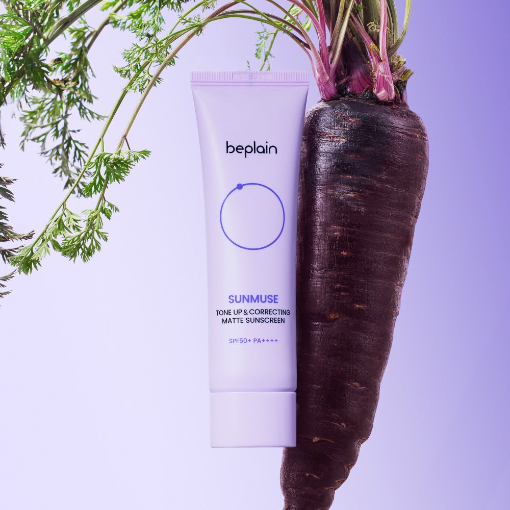 beplain Sunmuse Tone-Up & Correcting [Matte] Sunscreen (SPF50+/PA++++) 50ml next to dark purple carrot on lavender background