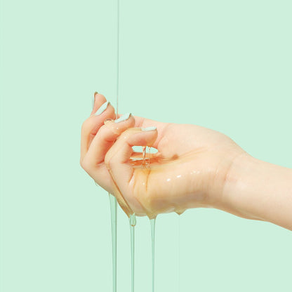 beplain Cicaterol Ampoule 30ml soothing serum texture dripping down hand against pale mint background