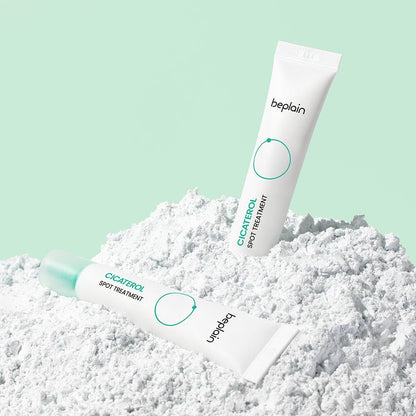beplain Cicaterol Spot Treatment 15ml tubes on textured white powder with soft mint green background