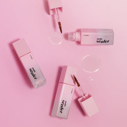 Three ETUDE Bare Edge Makeup Multi Sealer 8g bottles with applicators and clear product drops on pink surface