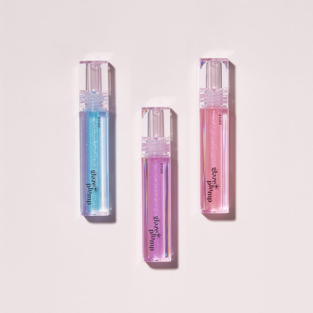 ETUDE Glaze Plump Gloss 4g in shimmering blue, purple, and pink tubes highlighting lip plumping effect
