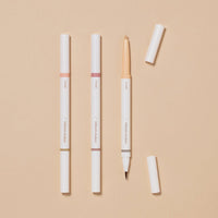 ETUDE Reborn Maker Liner 0.9g with double-tip design shown in soft neutral shades on beige background