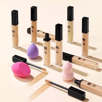 ETUDE Big Cover Skin Fit Concealer PRO bottles in versatile shades with applicators and blending sponges on beige background