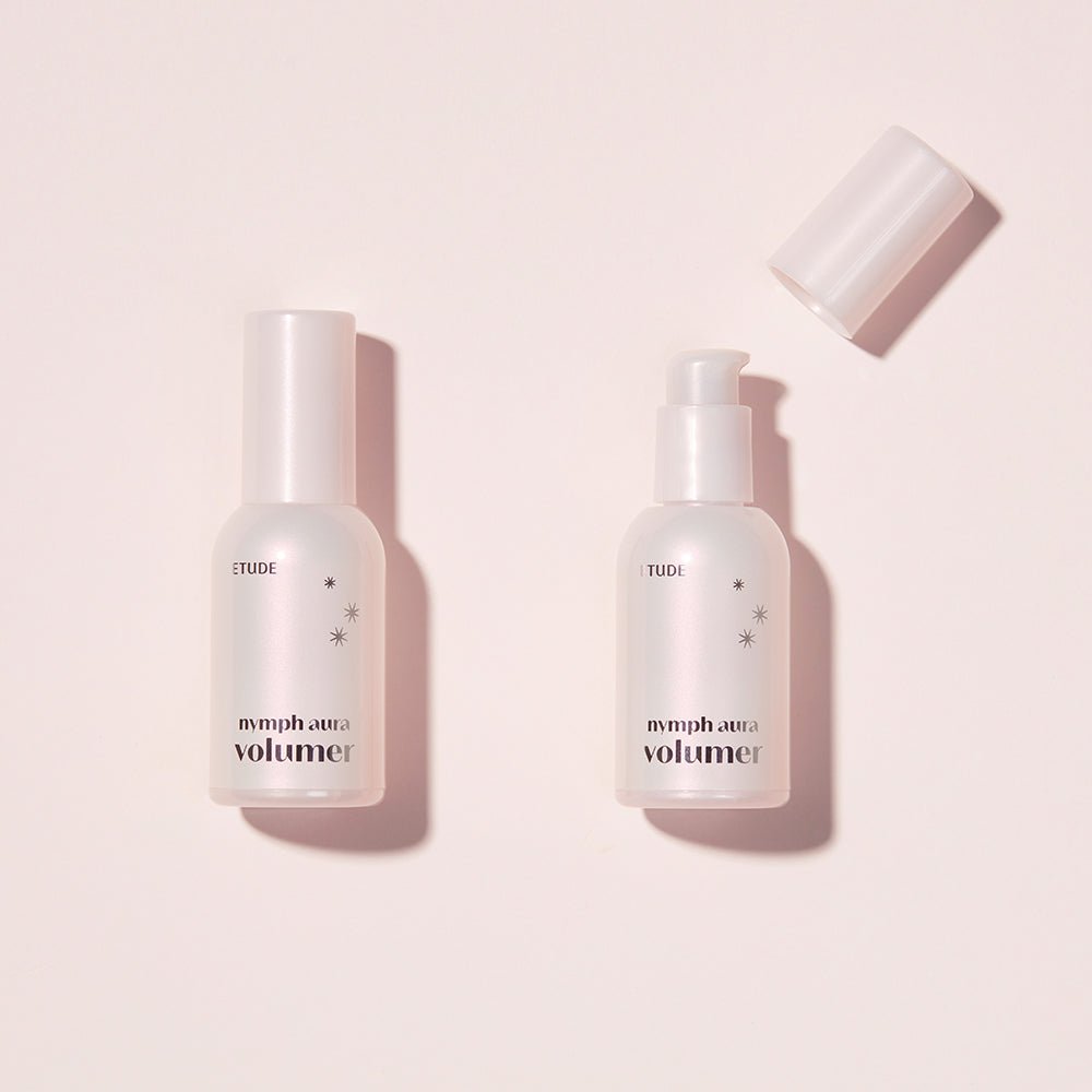 ETUDE Nymph Aura Volumer 24g bottles with pump and cap, promoting radiant glow in translucent frosted packaging