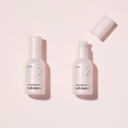 ETUDE Nymph Aura Volumer 24g bottles with pump and cap, promoting radiant glow in translucent frosted packaging