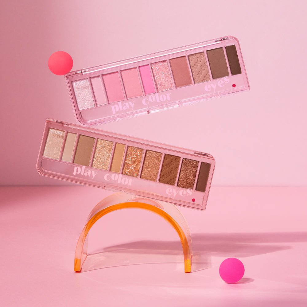ETUDE Play Color Eyes 5.7g versatile palette with pink and neutral shades in sleek transparent cases on pink background