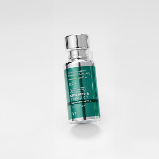 VT Cica Reti-A Essence 0.7 30ml in a sleek green and silver bottle for pore refinement and wrinkle care