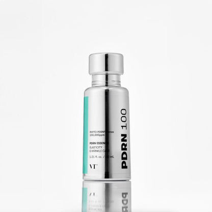 VT PDRN Essence 100 30ml silver bottle with reflective finish promoting radiant glow and elasticity care benefits