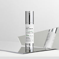 VT Reedle Shot 300 50ml in sleek silver bottle positioned on angled mirror reflecting deep hydration benefits