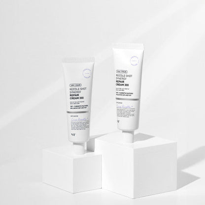 VT Reedle Shot Synergy Repair Cream 300 50ml tubes displayed on white blocks with sleek minimalist design and improved texture benefit