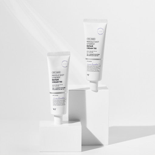 VT Reedle Shot Synergy Repair Cream 700 50ml tubes displayed on white blocks highlighting improved texture benefits
