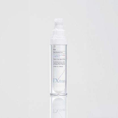 VT TX-toning Essence 2000 Shot 30ml clear bottle with white pump delivering brightening action for skin care routine