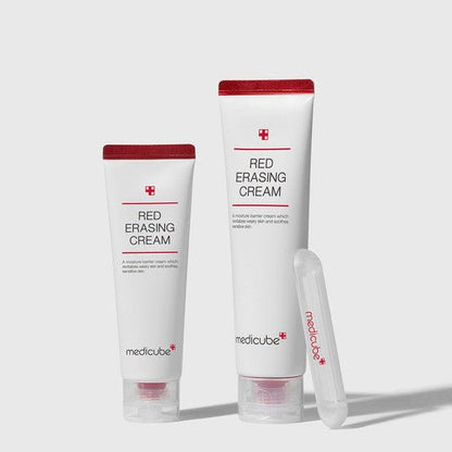 medicube Red Erasing Cream 50ml tubes with red caps standing next to clear applicator on light background