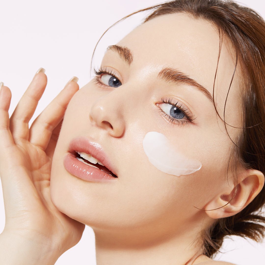 medicube Triple Collagen Cream 50ml applied on cheek highlighting improved elasticity and smooth skin texture benefits