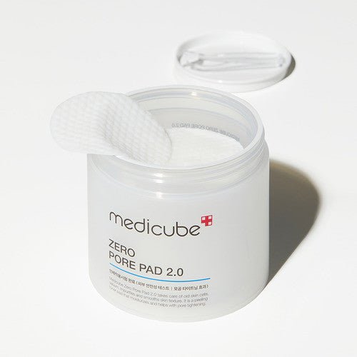medicube Zero Pore Pad 2.0 container open with textured white pad showing pore tightening skincare solution